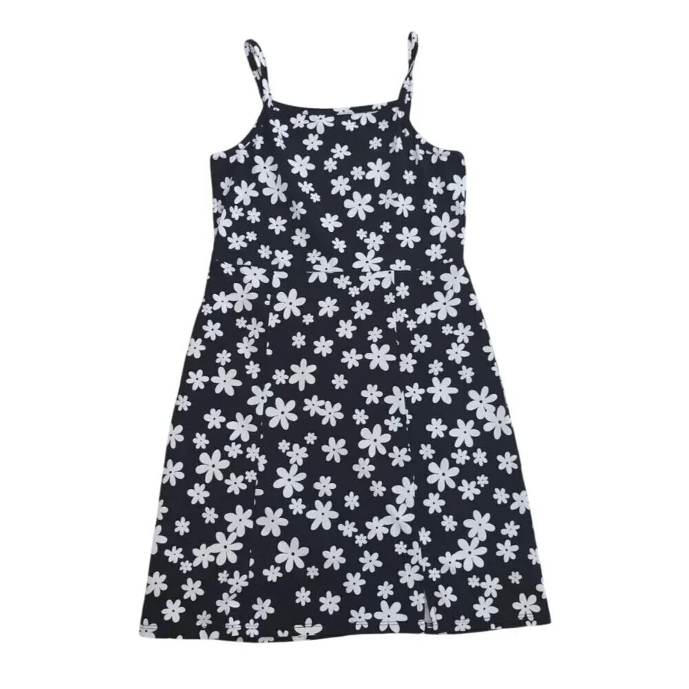 art class. Girls black and white floral print dress and white shirt sleeve. NWT